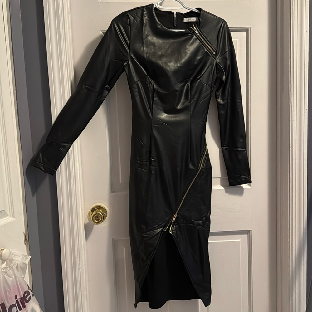 Soft leather dress with zipper detailing that are functional!!!